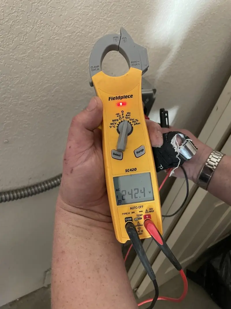Voltage testing with clamp meter during Aluminum Wiring Replacement in Surprise